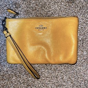 COACH wristlet- mustard